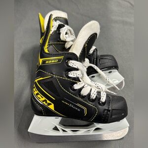 Pair of Kids CCM Super Tacks 9350 Hockey Skates